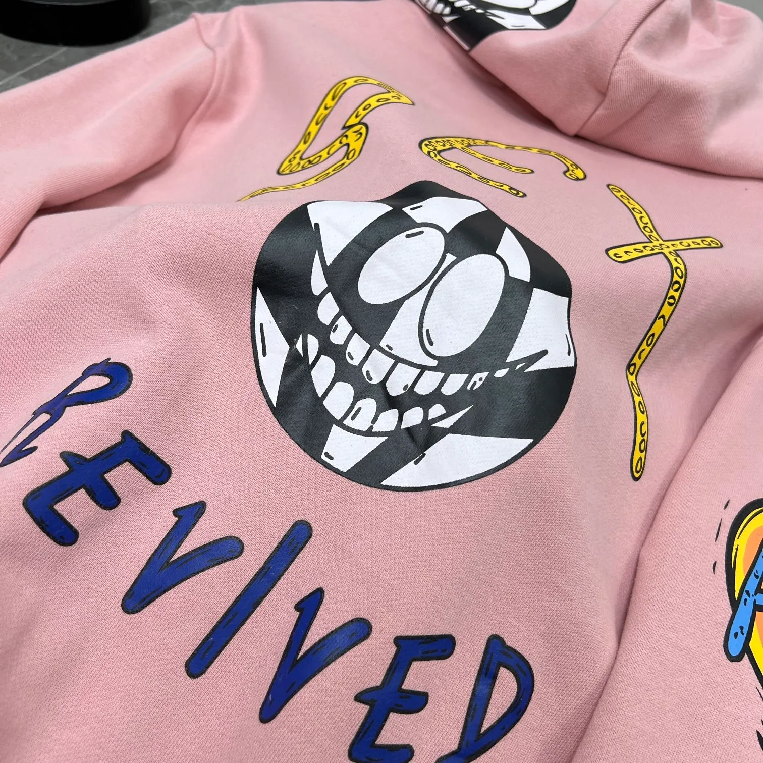 P250 Chrome Hearts Autumn and Winter 2025 counter synchronized Sanskrit hand-painted graffiti hooded sweatshirt, a must-have for Ins celebrity couples, same style for men and women! Specially customized version of 1:1 high-weight fabric, the same style as fashionable celebrities, a must-have for Internet celebrities! Recommended color: pink Size: S, M, L, XL